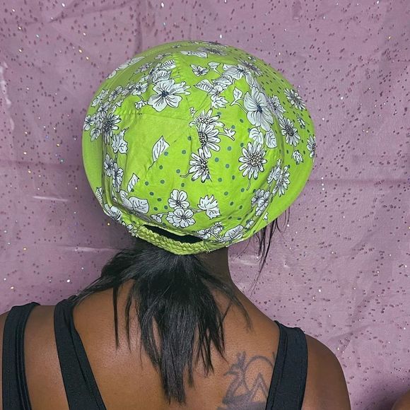 Lime green with flowers and reversible! Has a little boat on the plain side. Bet - Picture 3 of 4